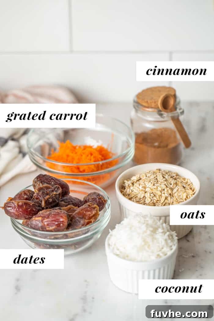 Spiced Carrot Cake Fuel Bites 3 Oats, dates, grated carrot and dried coconut in bowls on a counter.