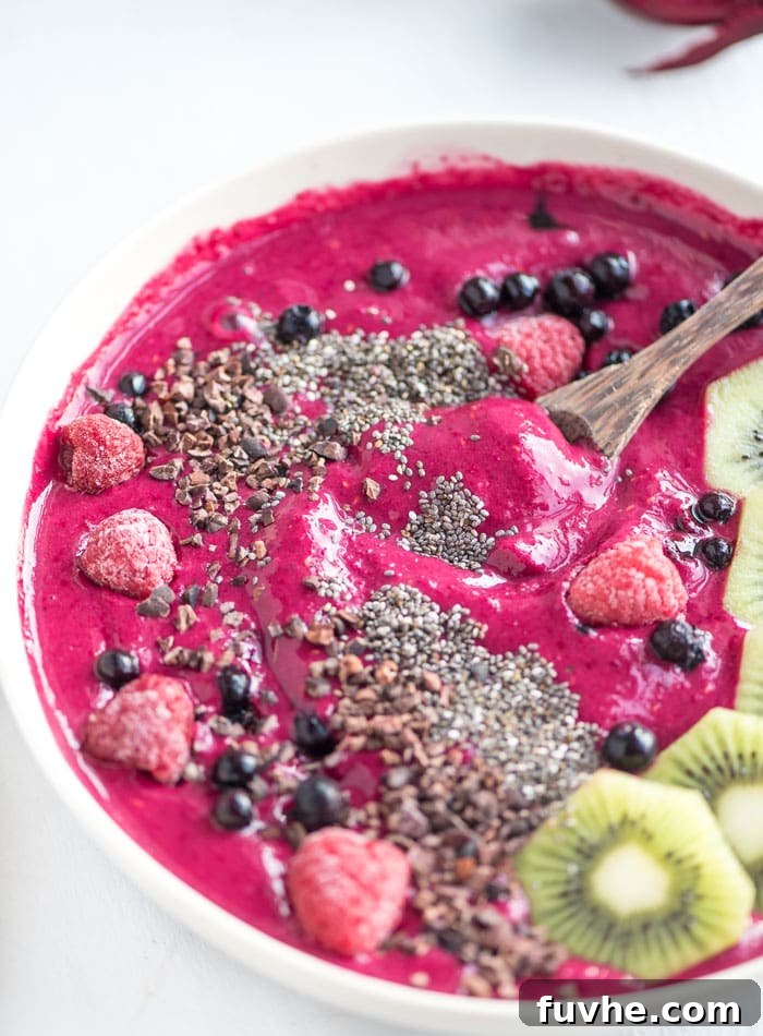 Vibrant Strawberry Beet Smoothie Bowl 2 Vegan Strawberry Beet Smoothie Bowl - A vibrant, nutritious blend of strawberries and beets, perfect for a healthy start.