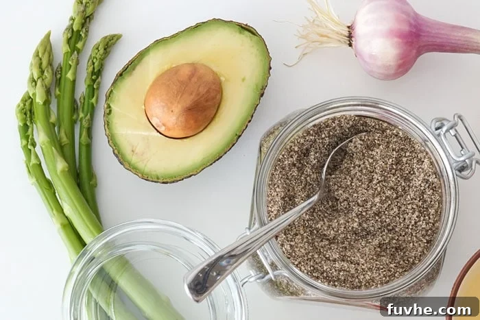 Healthy fats from avocado and nuts, illustrating anti-inflammatory choices for dietary lipids.