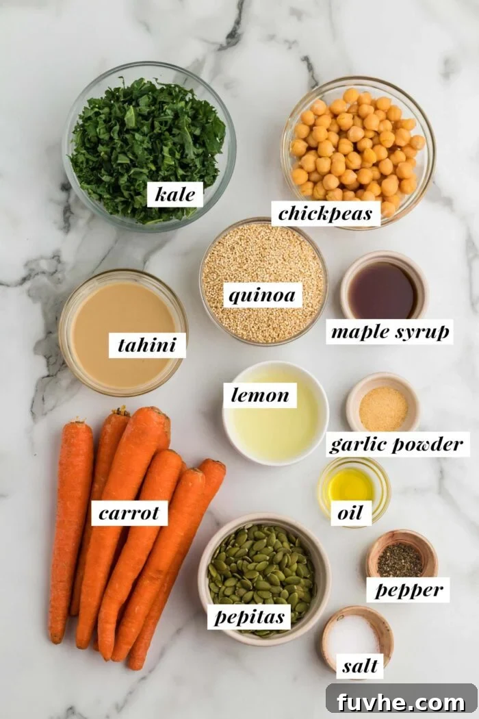 Nourishing Kale Quinoa Chickpea Bowls 3 A curated collection of fresh ingredients laid out for a kale, quinoa, chickpea, and carrot salad, ready to be transformed with a vibrant tahini sauce.