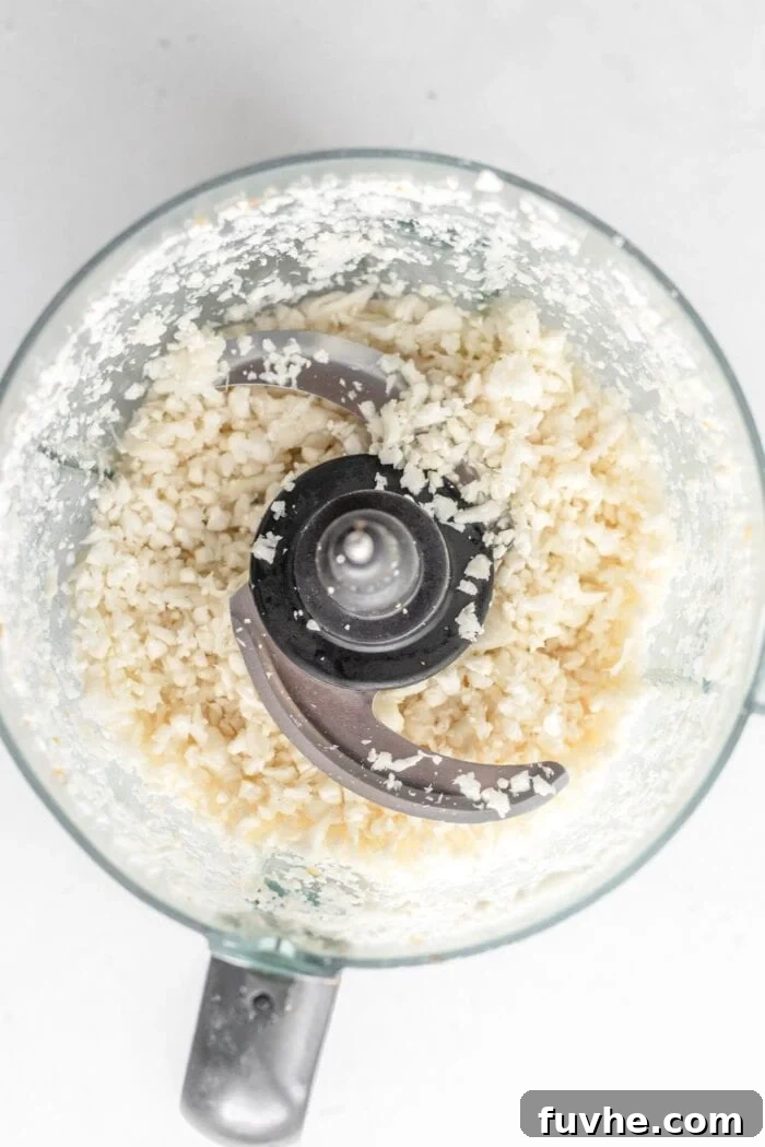 Whipping Up Perfect Cauliflower Rice 4 Rice cauliflower in a food processor.
