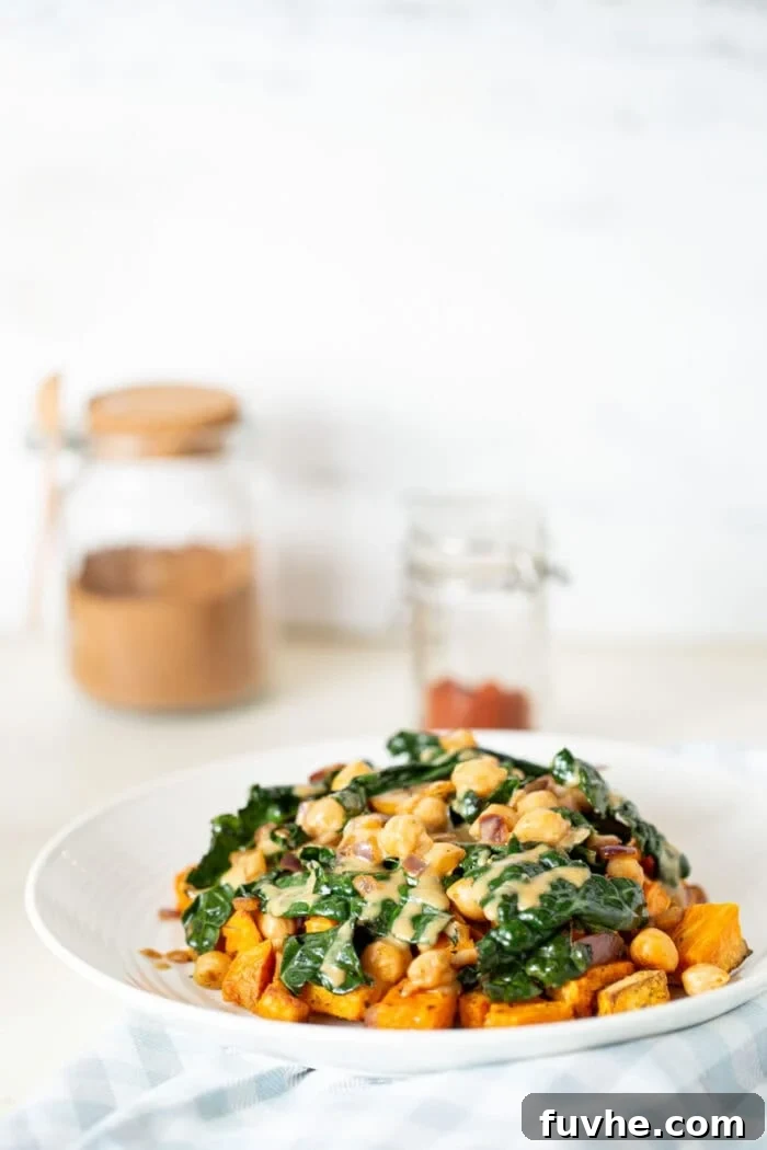 Vibrant Chickpea Kale Stir Fry 8 A full plate of vegan kale chickpea stir fry with miso peanut sauce, artfully arranged and garnished.
