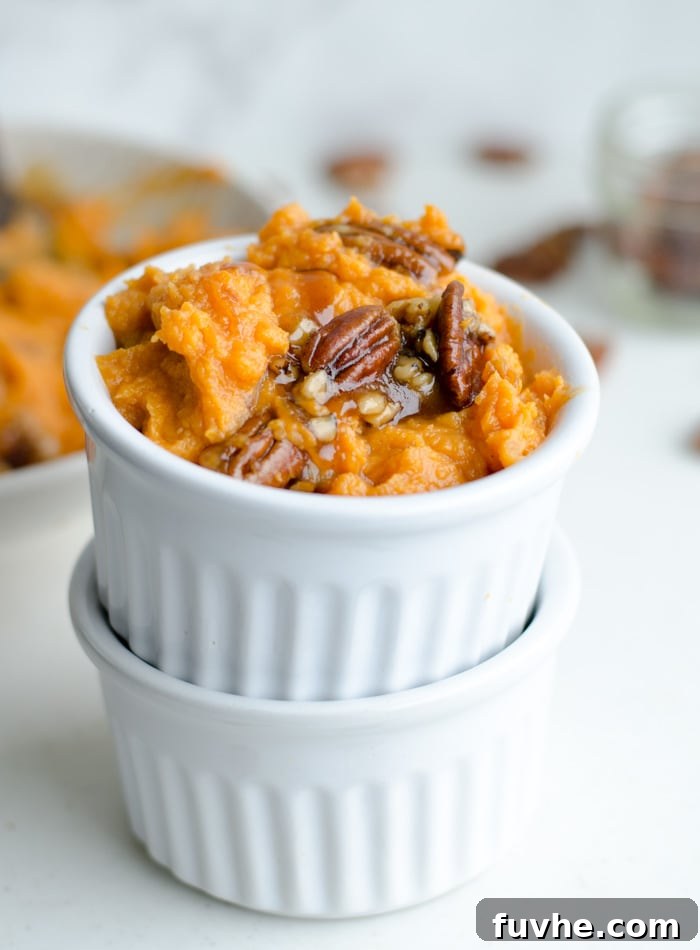Close-up of Maple Pecan Sauce over Coconut Mashed Sweet Potatoes