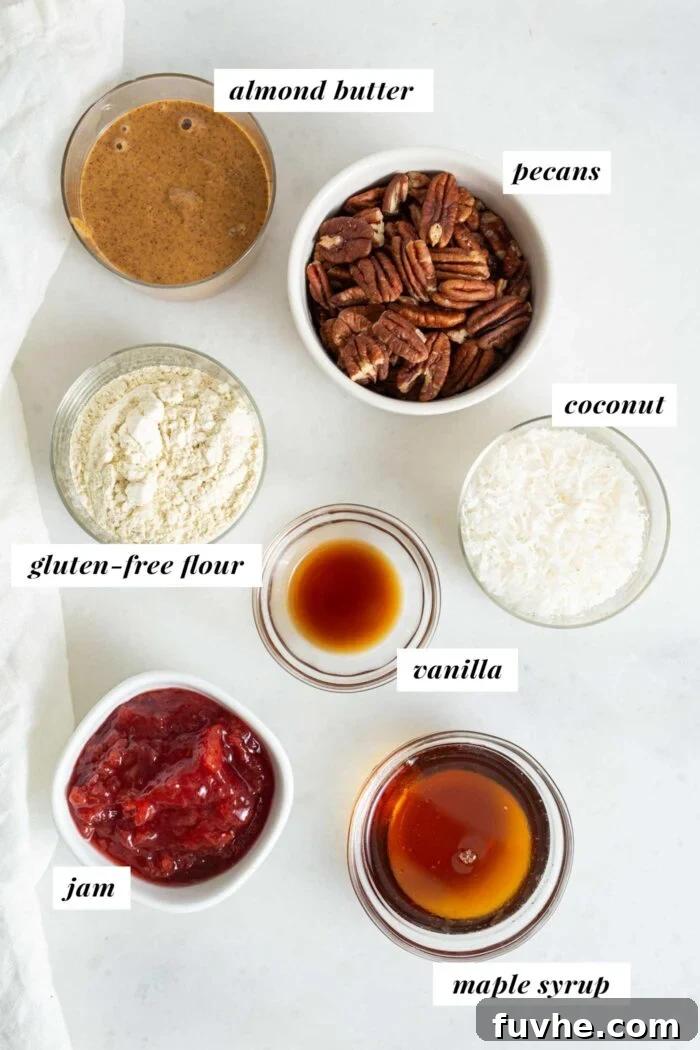An organized display of various baking ingredients, including nuts, flour, coconut, and syrup, each in its own small bowl, ready for mixing.