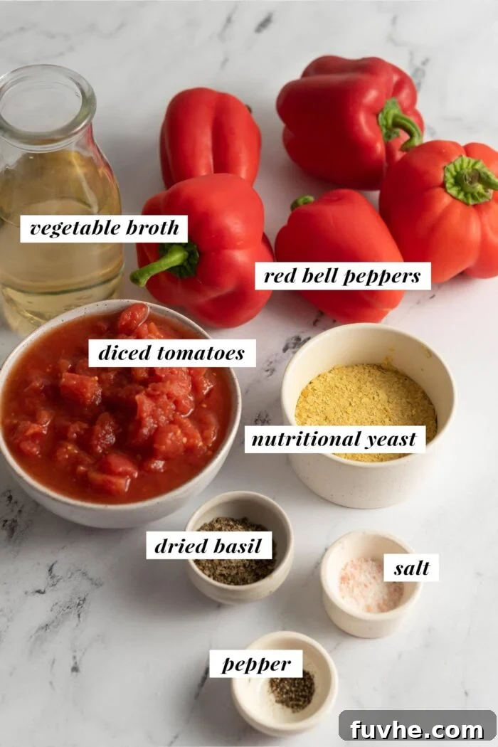A visual guide to the fresh and pantry staples needed for a homemade roasted red pepper tomato soup, neatly arranged and labeled.