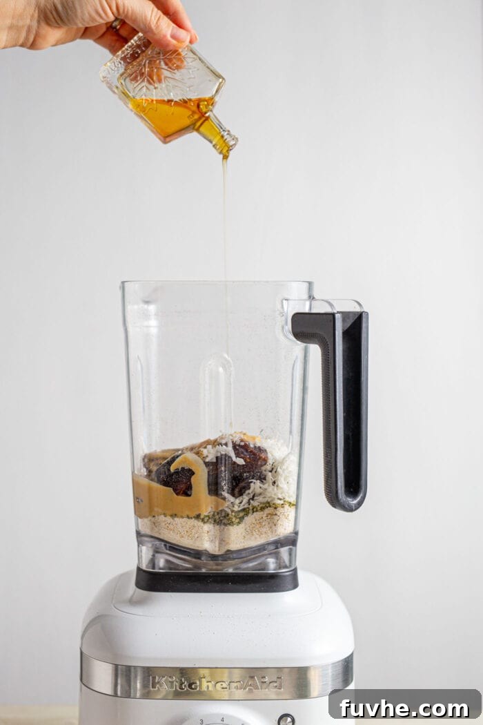 Sweet Swaps from Nature 3 Syrup being poured into a blender.