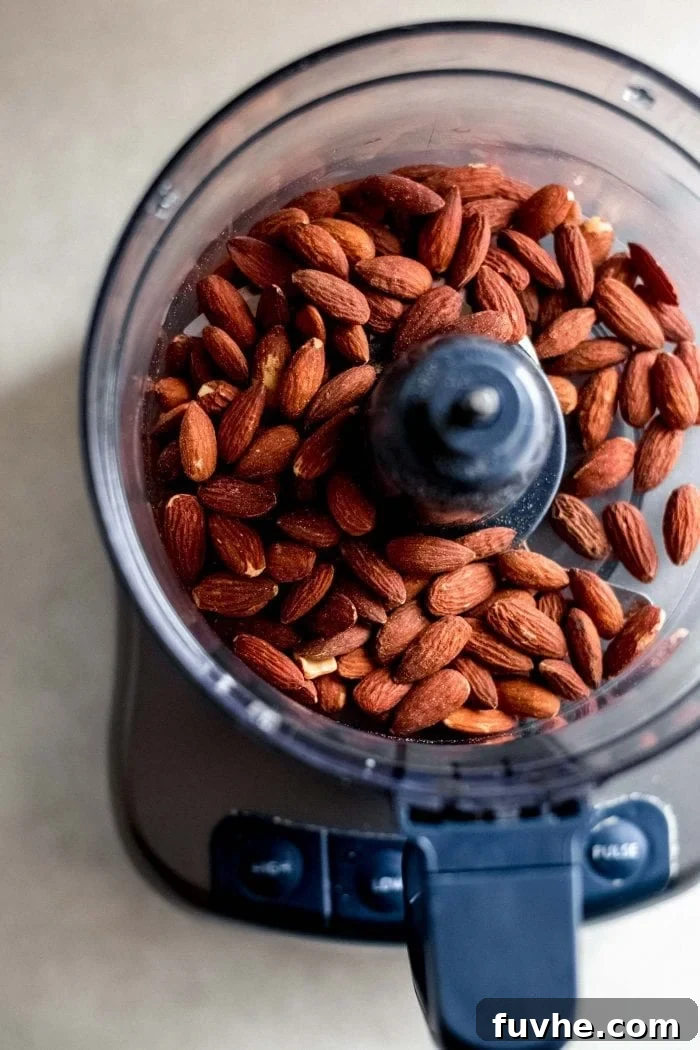 A beautifully arranged selection of vegan ingredients including nuts, seeds, and dried fruits, showcasing healthy options for beginners on a plant-based diet.