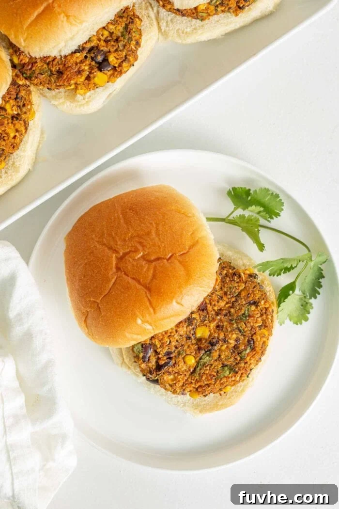 A sweet potato burger pattie on a bun.