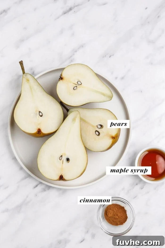 Warm Cinnamon Pear Delight 3 Beautifully sliced open pears arranged on a small plate, accompanied by small dishes containing golden maple syrup and fragrant cinnamon.