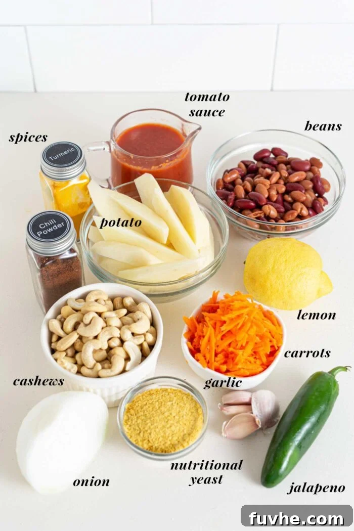 Ultimate Vegan Chili Cheese Fries 3 Various ingredients in jars and containers on a counter top for making vegan chili cheese fries.
