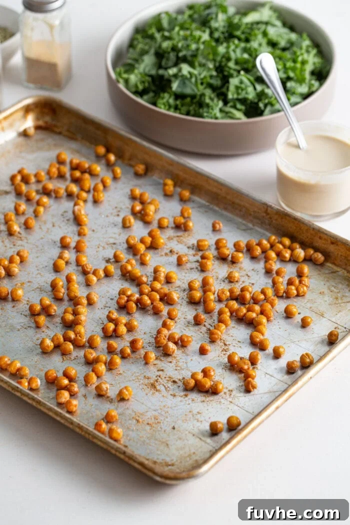 Roasted chickpea on a baking tray, golden brown and crispy.