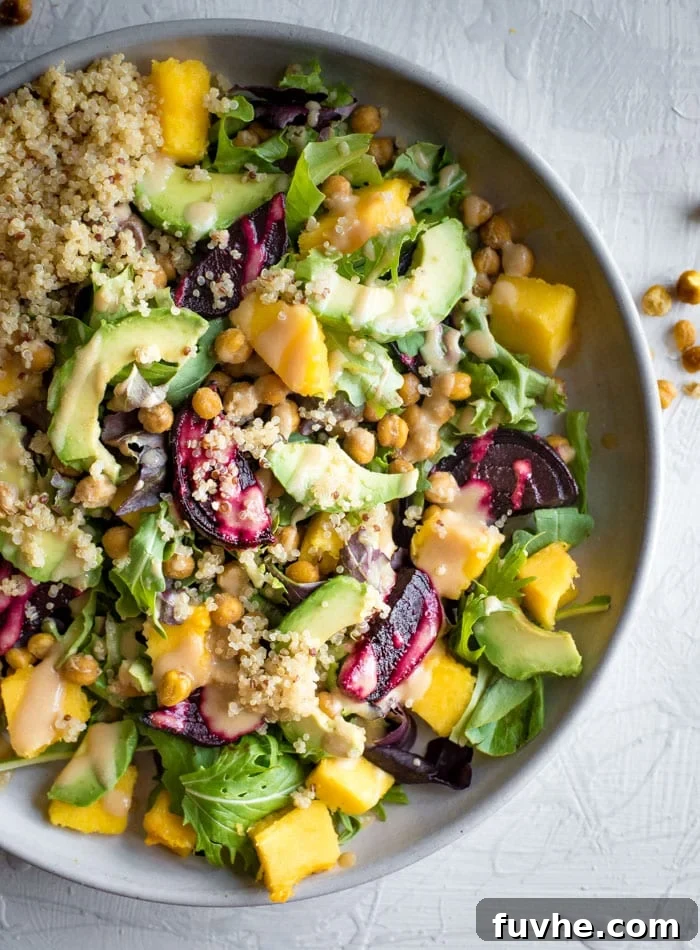 Delicious Vegan Beet Quinoa Avocado Salad with Maple Dijon Vinaigrette