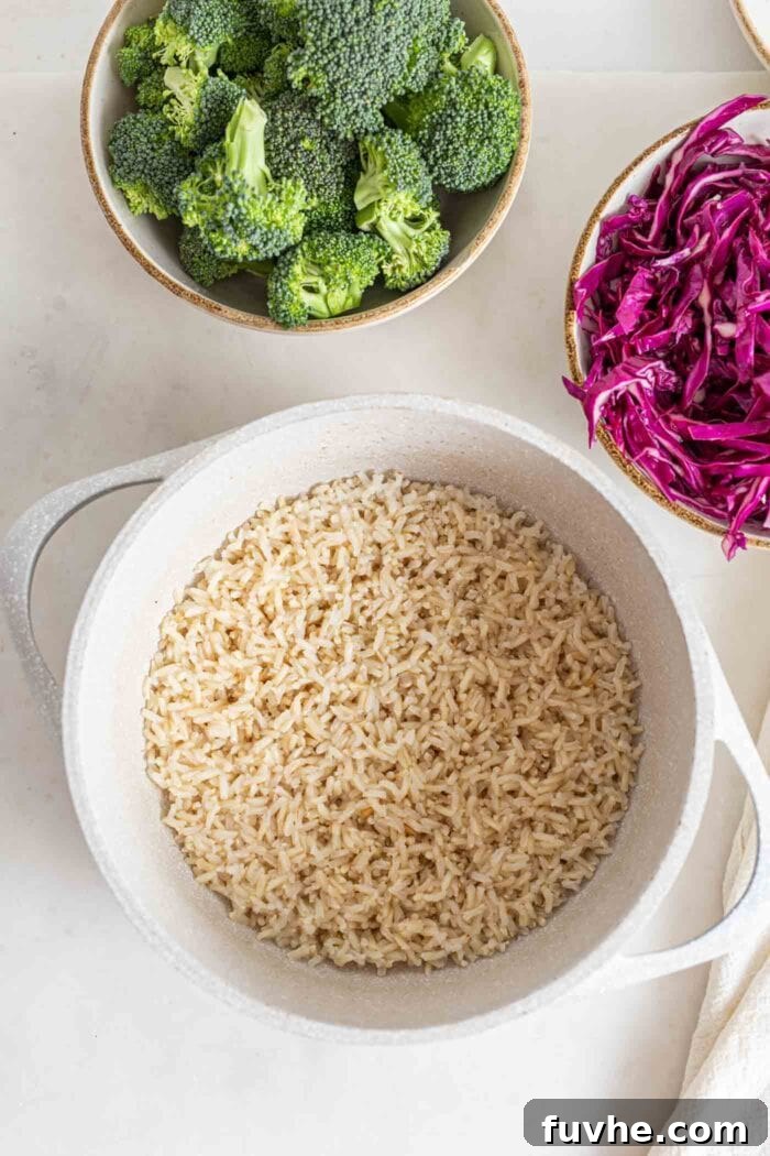Cooked brown rice in a large pot.