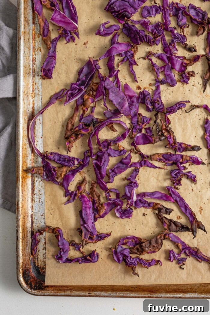 Roasted red cabbage on a baking tray.