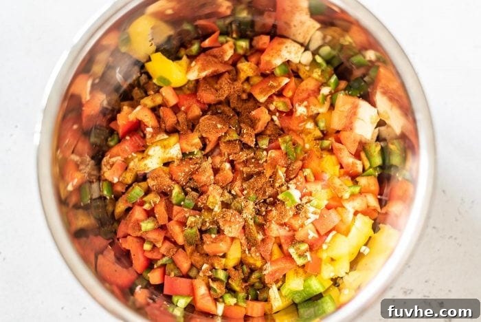 Bell peppers, onion, jalapeno and spices in an Instant Pot.