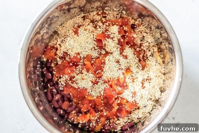Quinoa, diced tomatoes and kidney beans in an Instant Pot.