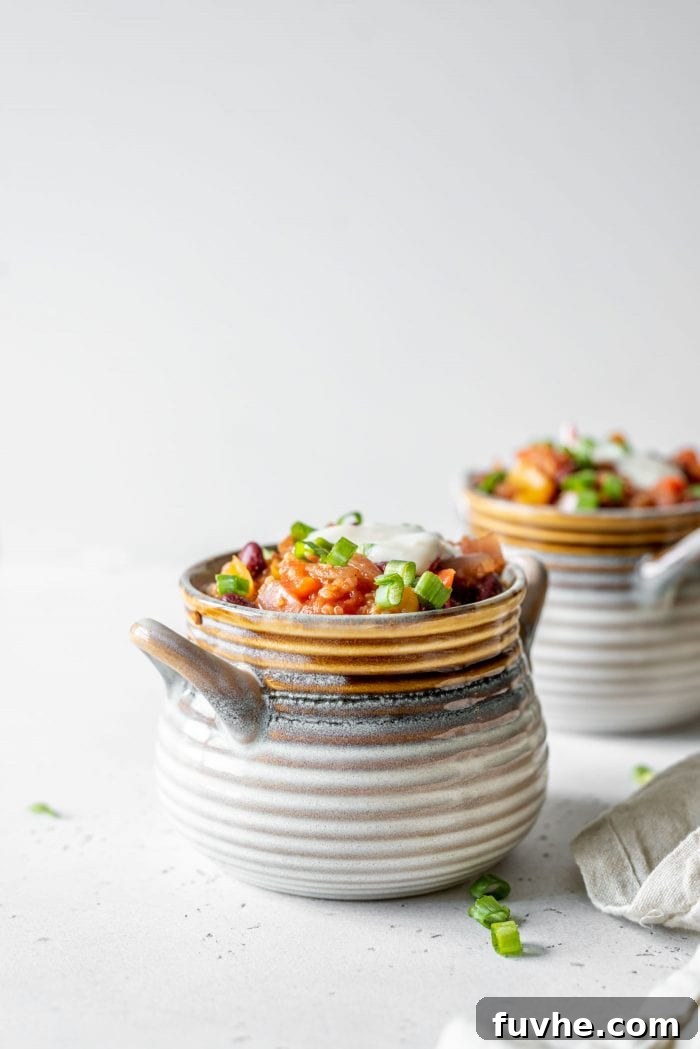 Two bowls of vegan quinoa chili.
