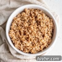 Perfect Instant Pot Farro 7 A bowl of perfectly cooked, fluffy Instant Pot farro, ready to be enjoyed as a wholesome and versatile meal component.