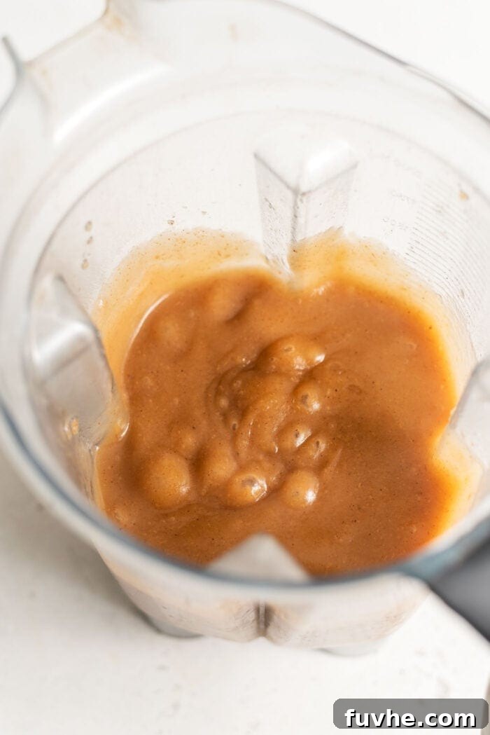 Blended applesauce in a Vitamix container.