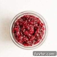 Homemade Cranberry Sauce in a jar, ready to be served