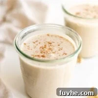 Festive Vegan Nog 9 Two glasses of healthy vegan eggnog.