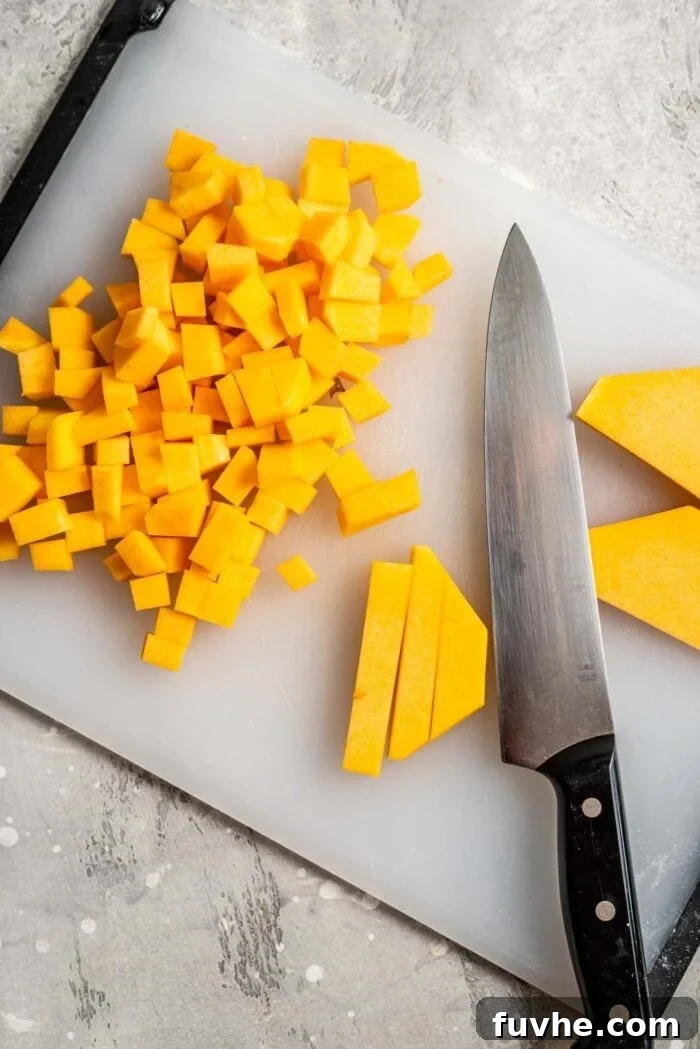 Roasted Butternut Crostini 4 Chopped butternut squash on a cutting board, ready for roasting.