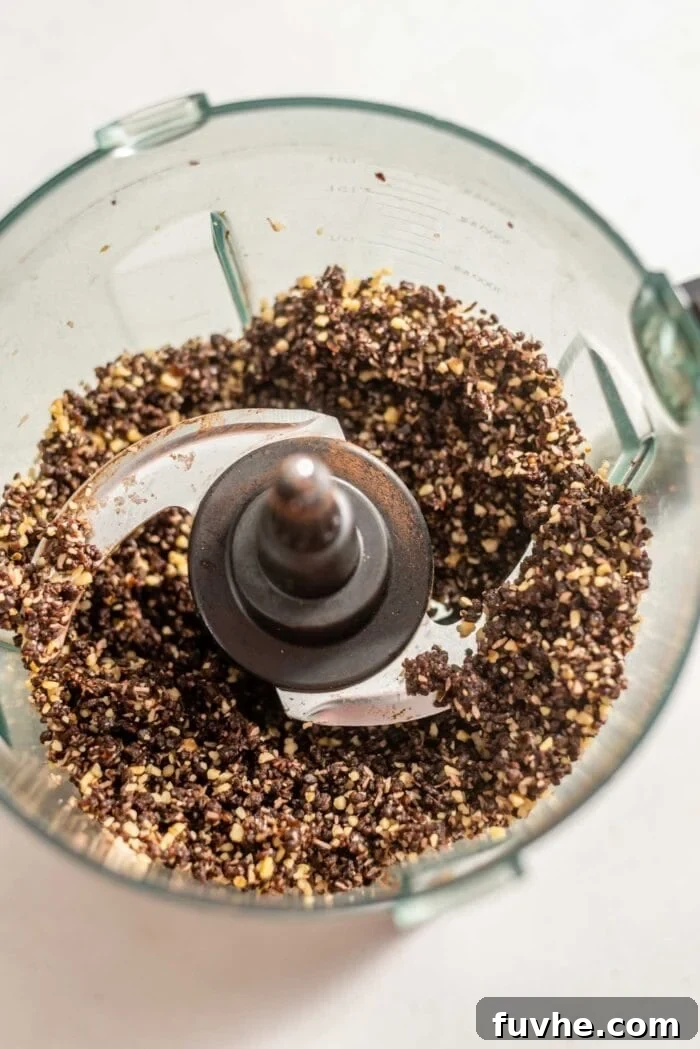 Vegan Nanaimo Bar Delight 5 Blended chocolate crust dough in a food processor.