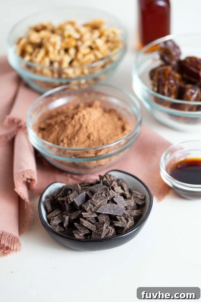 Iron Rich Vegan Foods 12 Bowls of chocolate, cocoa powder, dates and walnuts.