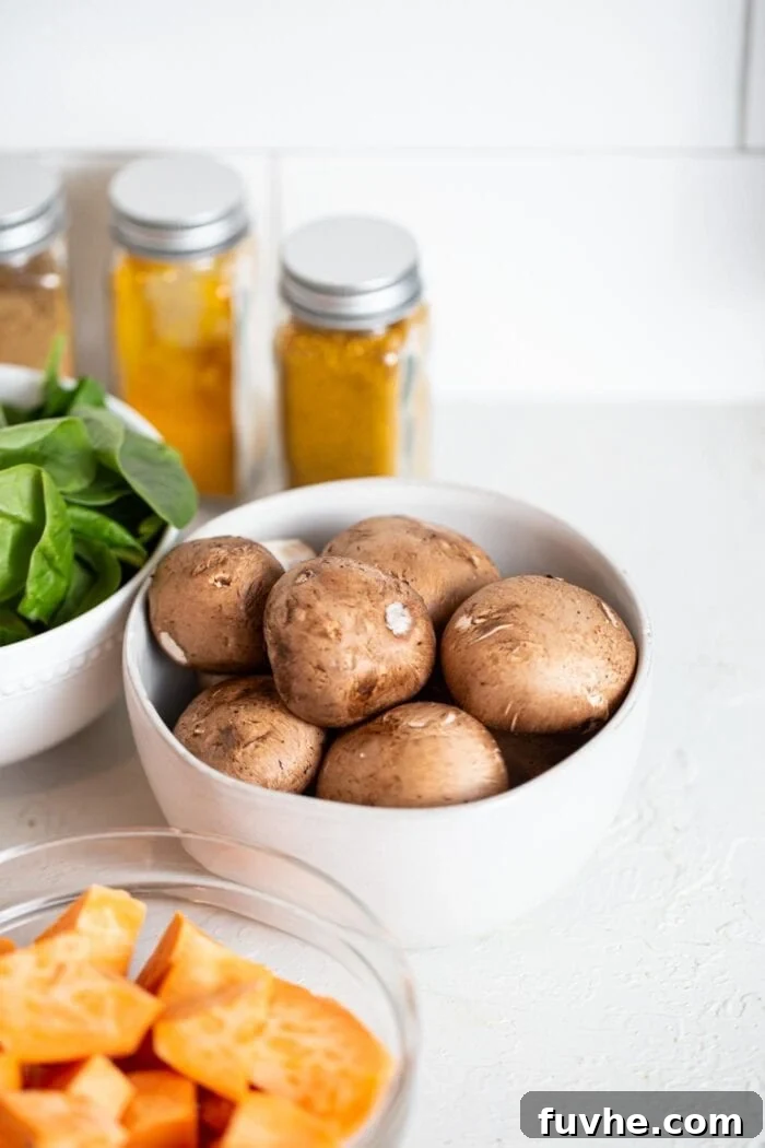 Iron Rich Vegan Foods 6 A bowl of raw mushrooms on a counter.