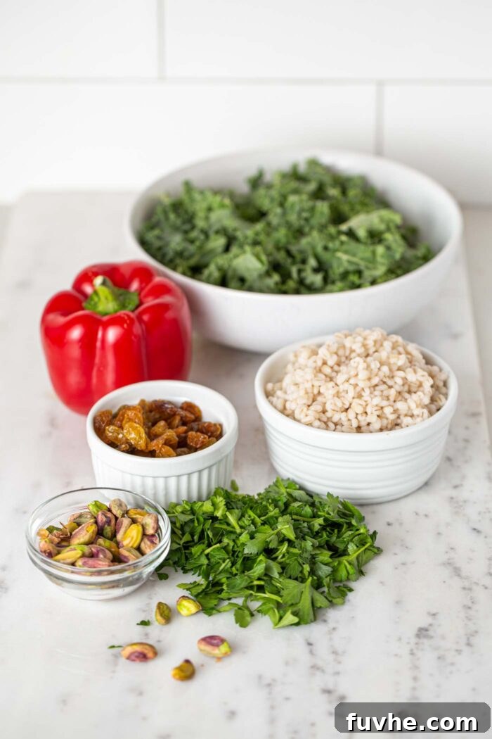 Iron Rich Vegan Foods 7 Pistachios, barley, bell peppers, kale and parsley in bowls on a countertop.
