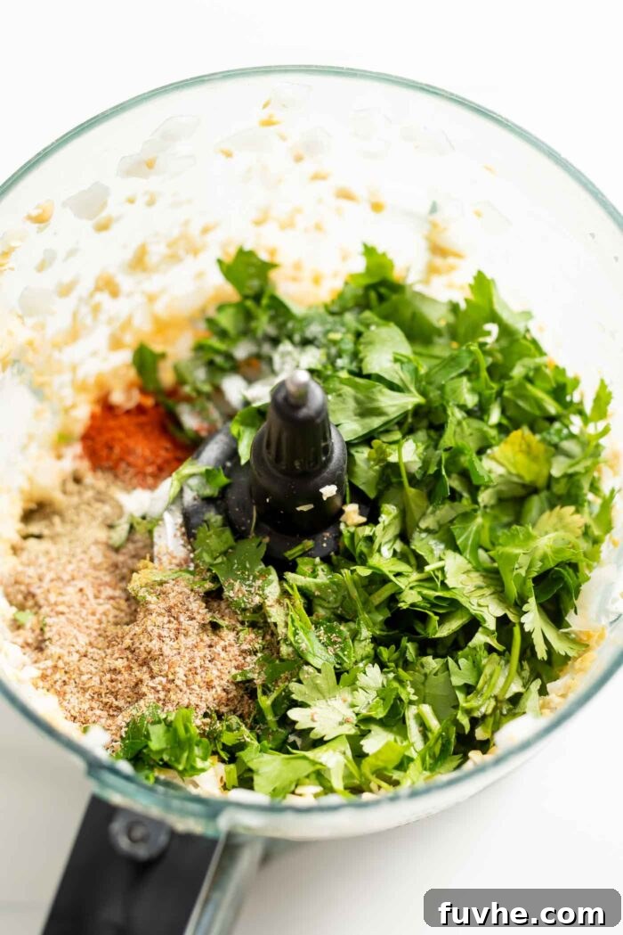 Golden Baked Falafel 6 Fresh herbs, ground flaxseed, and spices added to the food processor with the chickpea mixture.