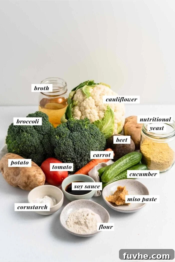 A visual guide of all the ingredients laid out and labelled for making vegan dragon bowls with a rich miso gravy.