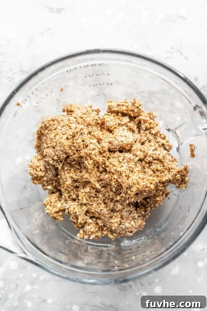 Coconut almond date cookie dough in a bowl.