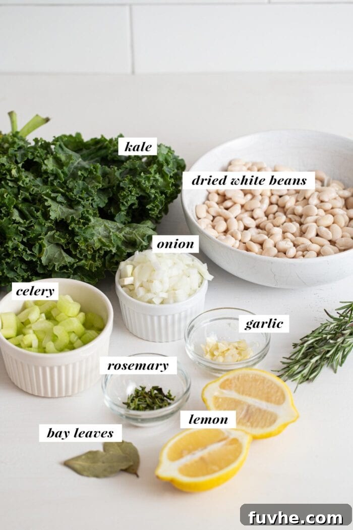 Nourishing Tuscan Kale and White Bean Soup 3 Visual of all ingredients needed for making a white bean and kale soup recipes. Ingredients are labelled with text overlay.
