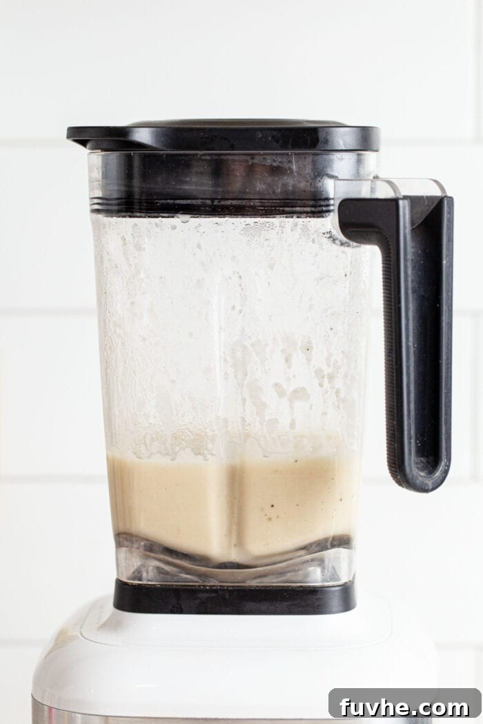 Nourishing Tuscan Kale and White Bean Soup 6 Blended creamy white bean soup in a blender.