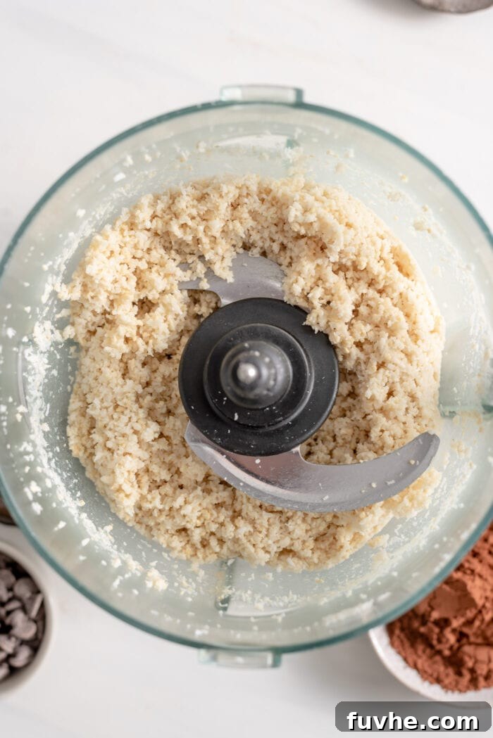 Decadent Vegan Chocolate Macarons 5 Blended coconut and cashews in a food processor.