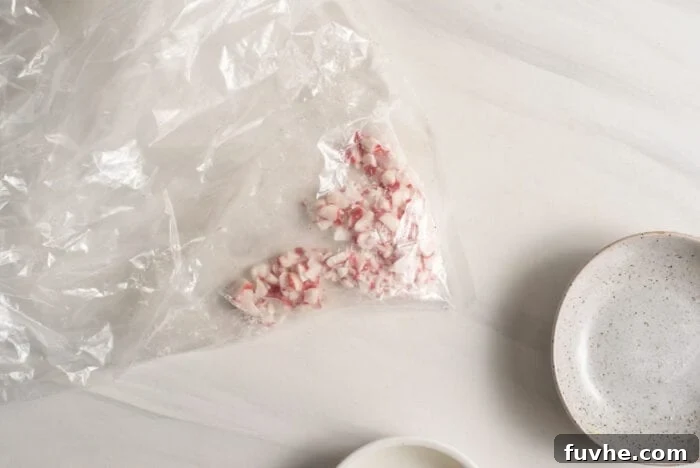 Irresistible Vegan Chocolate Peppermint Delights 7 Crushed candy canes in a plastic bag, ready for topping freshly baked cookies.