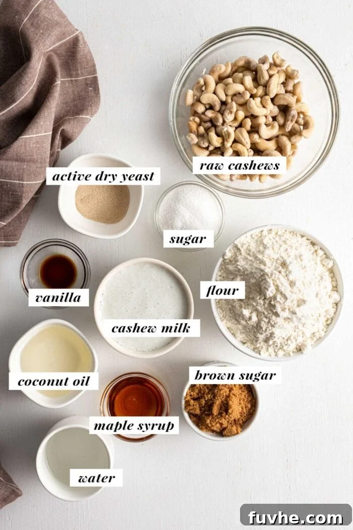 A visual display of all the individual ingredients required for preparing vegan cinnamon rolls, clearly labelled with text overlay.