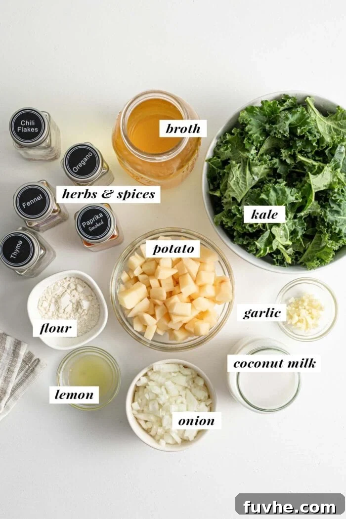Creamy Plant Based Zuppa Toscana 3 A vibrant flat lay showcasing all the fresh and pantry ingredients required for a delicious vegan Zuppa Toscana, including neatly arranged potatoes, onions, kale, various spices, and a can of coconut milk.