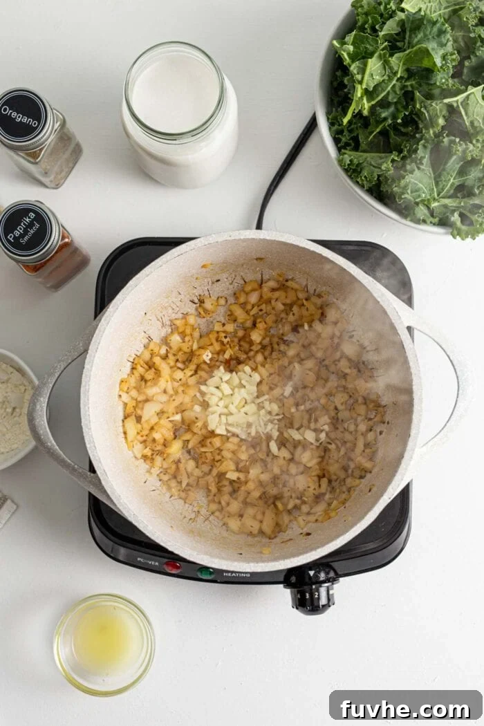 Creamy Plant Based Zuppa Toscana 5 Fragrant onions and garlic cooking in a pot, with lemon juice being added to deglaze the pan, surrounded by small bowls of ingredients.