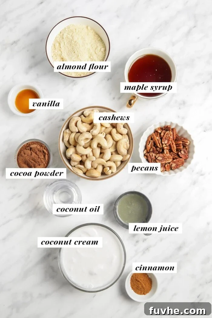 A flat lay photograph showcasing all the whole food ingredients meticulously arranged for making a vegan no-bake chocolate cheesecake, with labels for each item.