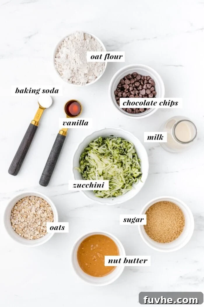 Visual list of ingredients for making chocolate chip zucchini cookies.