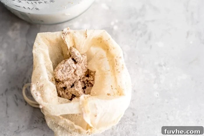 Leftover almond pulp from making almond milk in a nut milk bag.