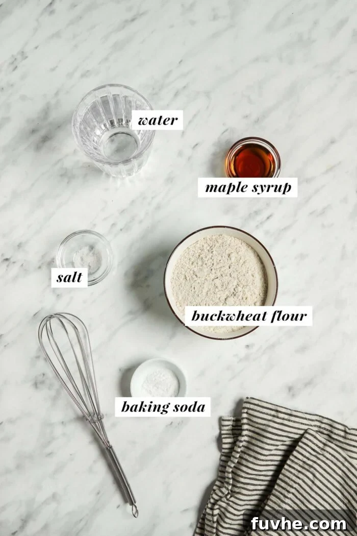 Individual small bowls containing the core ingredients for vegan buckwheat crepes: water, pure maple syrup, light buckwheat flour, a pinch of salt, and baking soda. Each bowl is clearly labeled with a text graphic of its contents.