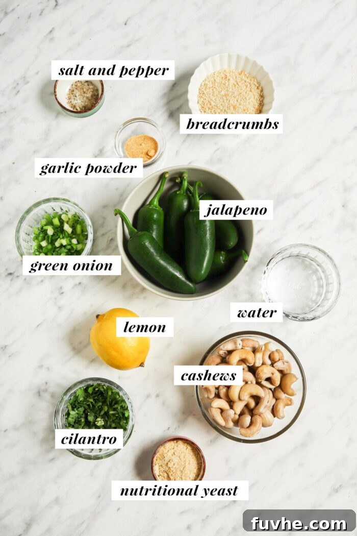 Creamy Vegan Jalapeño Bites 3 All the vibrant, fresh ingredients laid out for preparing baked vegan jalapeño poppers, with each item clearly visible and inviting.