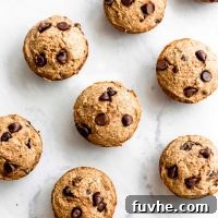 Vegan chocolate chip banana muffins on a marble surface, a delightful image to accompany the recipe.