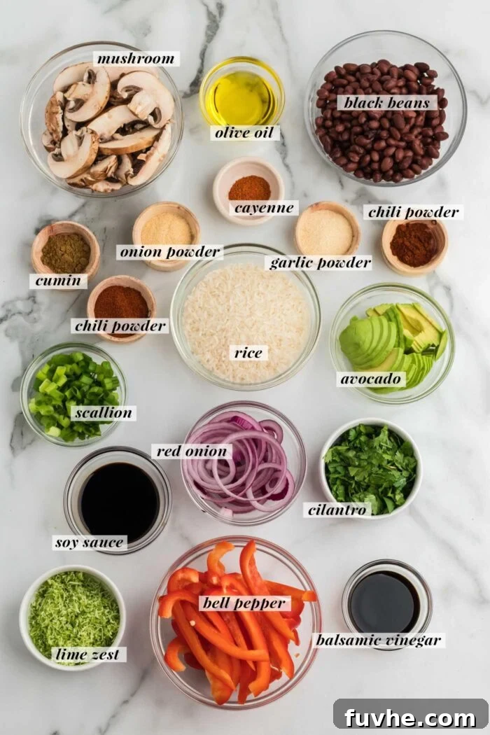 Zesty Plant-Powered Fajita Bowls 3 All the ingredients mise en place for making vegetarian fajita bowls with spices, mushrooms, peppers, onions and black beans.