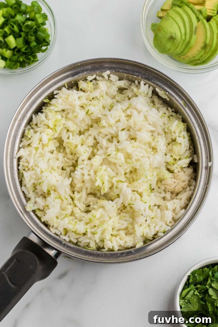 Zesty Plant-Powered Fajita Bowls 6 Cooked rice with lime zest and cumin in a sauce pan.