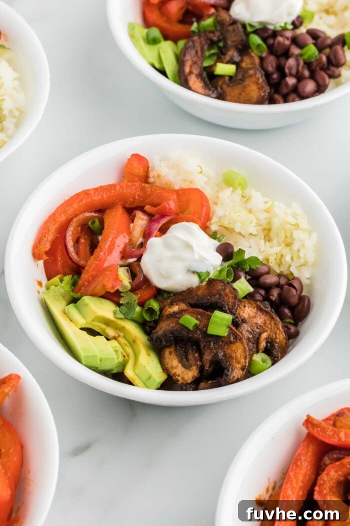 Zesty Plant-Powered Fajita Bowls 10 Vegetarian fajita bowls with cooked bell peppers and onions, avocado, rice, sour cream, black beans and marinated cooked mushrooms.