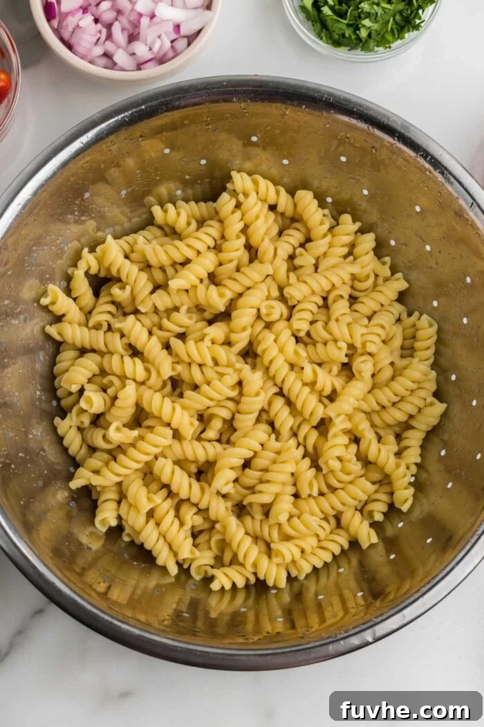 Chipotle Lime Vegan Pasta Salad 5 Cook rotini pasta in a colander.
